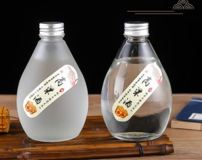 China Beverage Drop Shaped 100ml 280ml 350ml Jug Transparent Frosted Crystal White Wine Bottle for sale