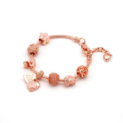 China Best Selling TRENDY Rose Gold Crystal Rhinestone Flower Heart Charm Epoxy Bracelet for sale