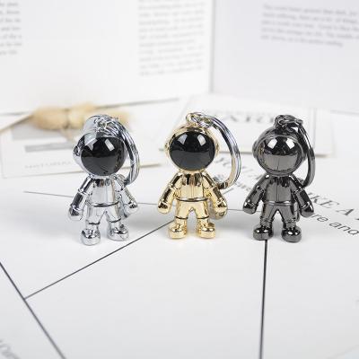 China Luxury Leather Robot Pendant Men's Space Car Key Chain Girls' Pendant Bags for sale