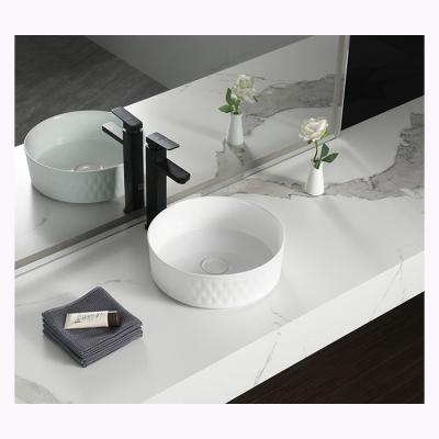 China Good Selling Simple Modern Lavabo Countertop Small Bathroom Sinks Round Wash Basin for sale