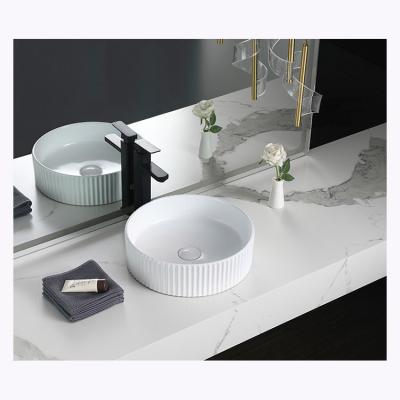 China Wholesale Modern Porcelain Art Sanitary Basin Round Wash Basin Art Ceramic Countertop Wash Basins for sale