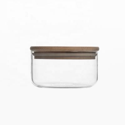 China Sustainable 330ml Glass Storage Jar With Lid Kitchen Food Use Glass Storage Jar Bamboo Food Jar for sale