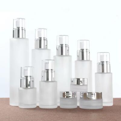 China Glass Bottle Set 20ml 30ml 40ml 60ml 80ml 100ml 120ml Spray / Lotion Pump Bottle And 5g 10g 20g 30g 50g Cosmetic Jar With Silver Top for sale