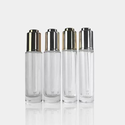 China Personal care 30ml clear dropper essential oil glass bottle slugged bottom oil dropper bottle 30ml for sale