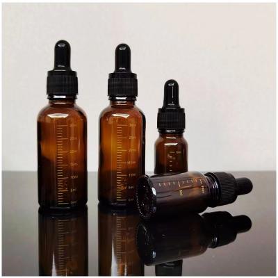 China Cosmetic Dropper Bottles With Amber Glass Aromatherapy Liquid Pipette Drop Scale Bottle Refillable Bottles 10ml 30ml 50ml For Travel for sale