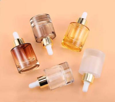 China New Design 30ml PrettyCare Serum Cosmetic Dropper Bottle Amber Clear Glass Bottles With Gold Caps For Essential Oils for sale