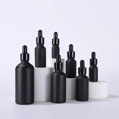 China Matte Black Round Essential Oils Aromatherapy Glass Cosmetic Bottles With Black Cap 5ml 10ml 15ml 20ml 30ml 50ml 100ml Dropper for sale