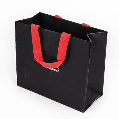 China Recyclable Wholesale Luxury Boutique Gift Shoes Clothes Kraft Paper Bags Printed Custom Logo Black Shopping Bag With Logo for sale