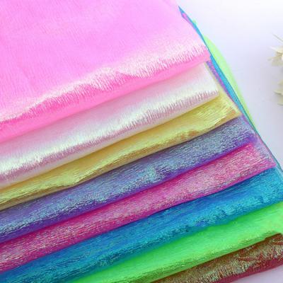 China QUICK DRY Shiny Polyester Organza Crepe Stage Wedding Dress Metallic Decoration Toy Fabric for sale