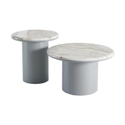 China Customizable Gemini Coffee Table in White Marble Mist Leather Wrap Up Base with Stainless Steel Frame for sale