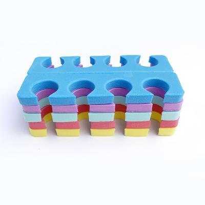 China Eco-friendly Wholesale Plastic Manicure Toe Separators 4 Hole Nail Kit For Salon for sale