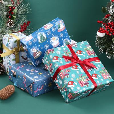 China Christmas Recyclable Santa Claus Coated Paper Packaging Paper Festival for sale