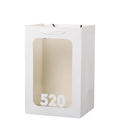 China Recyclable 520 Festival Wedding Clear Paper Bags Custom Logo Window Pockets Gift Paper Bag for sale