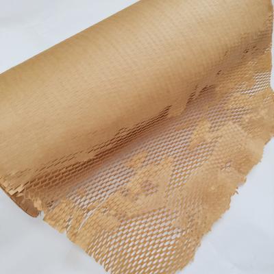 China Disposable Kraft Paper Shock Absorption Honeycomb Wrap Eco - Friendly Degradable Cushioning Kraft Paper for sale