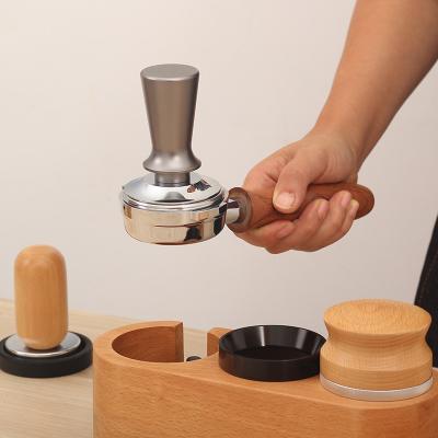 China Durable Stainless Steel Coffee Tools 58mm Elastic Coffee Dispenser Tamper 51mm Spring Coffee Tamper for sale