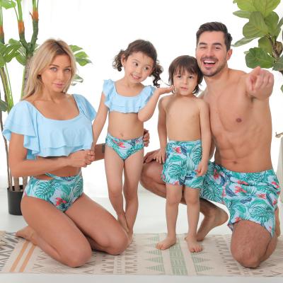 중국 2021 New Arrival Breathable Factory Family Swimwear 4pcs Parent-child Swimwear Matching Print Blue Tropical Swim Trunk Boardshorts 판매용