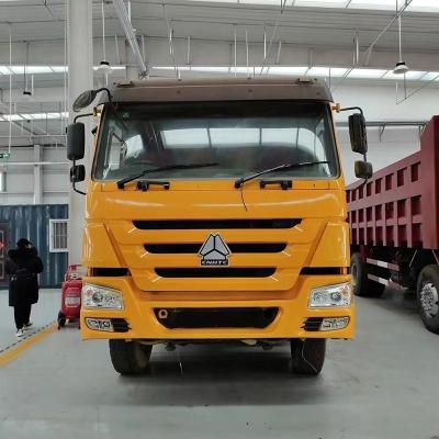 China Caminhão de 50 toneladas usado Sinotruk HOWO com cadeira de motorista de suspensão a ar à venda