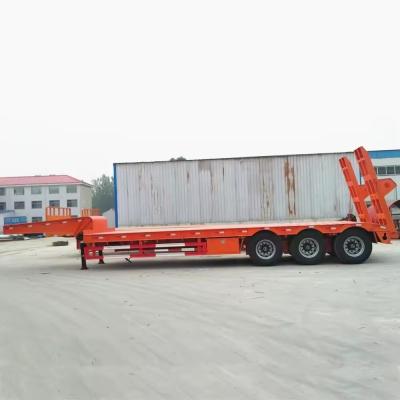 China Low Bed/Lowboy Semi-Trailers 3/4 Axle Low Loader Trailers 13500X3000X1550 mm Self-dumping for sale