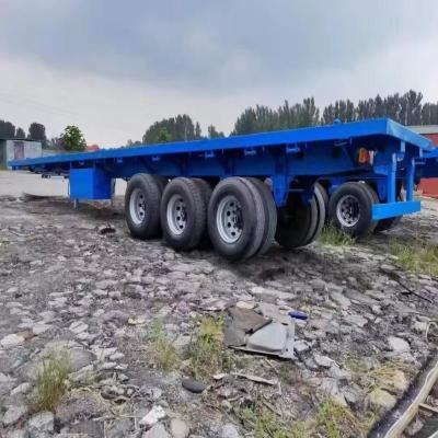 China 13500X3000X1550 mm Eisen-Lowbed Semi-Trailer für den Maschinenverkehr 13m Flatbed Trailer zu verkaufen