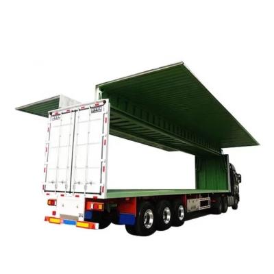 China 12 Meters Steel Box-Type 3-Axis Container Transport Semi-Trailer with Spinner Wing for sale