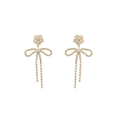 China FASHIONABLE Korean Fashion Designer Zircon Bow Personalized Earrings for sale