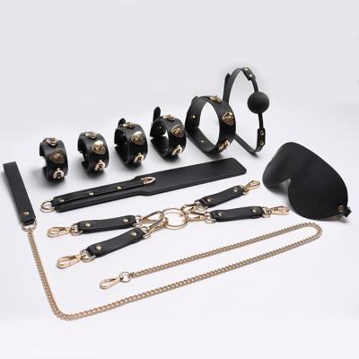 China BDSM Play Best Selling BDSM Bed Fun Bundle Suit Adult Leather Play Woman Bundle Suit Heart Stud Flirt Style for sale