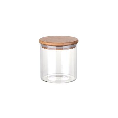 China Sustainable Custom Clear Glass Storage Jars Airtight Kitchen Glass Jars With Wooden Lid for sale