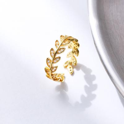 China Trendy Design Fashion Ring Jewelry 18k Gold Plated Brass CZ Stone Rings Hollow Leaf Rings Women for sale