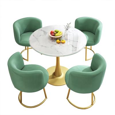 China Wholesale Modern Extendable Metal Restaurant Cafe Dining Tables And Chairs Set Table Four Chairs Leisure Table for sale