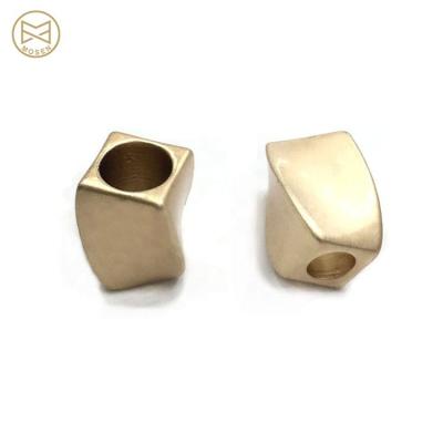 China Custom Gold Metal Rope End Clothing Rope Zinc Alloy Stopper Irregular Shaped Nickel Free for sale