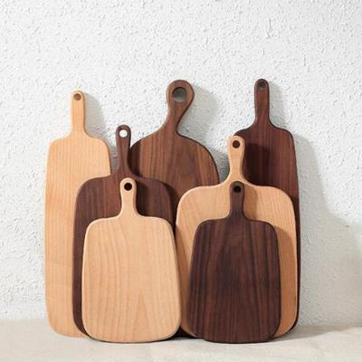 China Sustainable New Design Kitchen Accessories Beech Black Walnut Ebony Wooden Serving Tray Cutting Board for sale