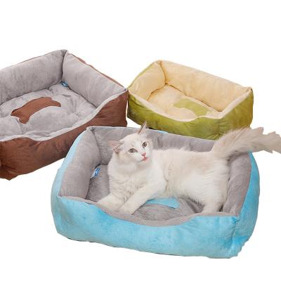 China Amazon Best Seller Sustainable Cat Pet Bed PP Soft Warm Cotton Stuffed Plush Dog Bed for sale