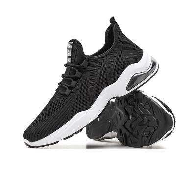 China Breathable Mesh Fly Woven Casual Sneakers Wholesale Fashion Trend Durable Men's Student Knit Shoes for sale