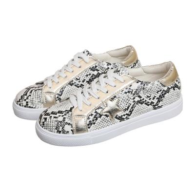 China Fashion trend high quality explosive European American large size flat sneakers snake print women casual shoes for sale