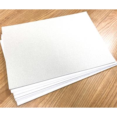 China 230gsm smooth 0.3mm~0.6mm super anti-curl 300gsm Clay Coated Paper Gray Back for sale