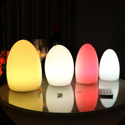 China Viable outdoor remote control colorful filling creative egg-shaped bar table KTV bar table lamp decoration table lamp for sale