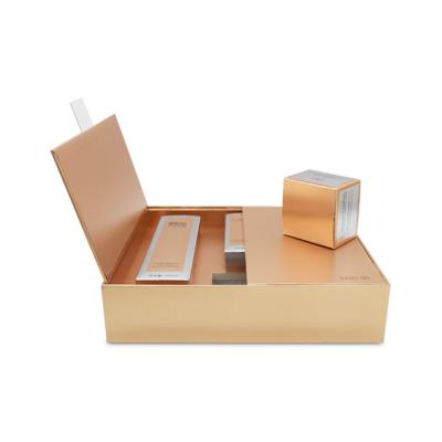 China Hot Selling New Design Gold Recyclable Cosmetic Gift Set Packaging Box Skin Care Essential Oil Cardboard Gift Boxes With Logo for sale