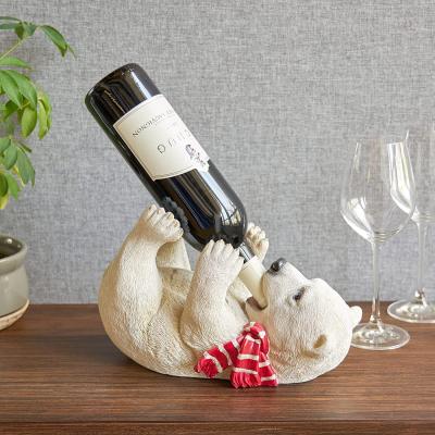 China 2021 Custom Made Viable Hot Selling Wine Racks European Decorative Polar Bear Statue Resin Style Tabletop Wine Rack for sale