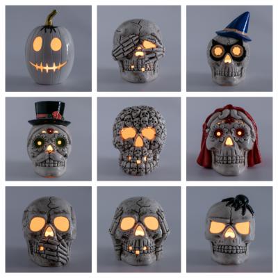 China 2021 Europe factory wholesale LED light carft ceramic skull Halloween ornament for sale