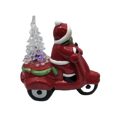 China Decoration LED Lighted Ornament Snowman Ride Motorcycle Christmas Ceramic Table Craft for sale