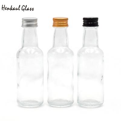 China 50ML High Quality Eco-friendly Recyclable Mini Glass Liquor Bottles Empty for sale