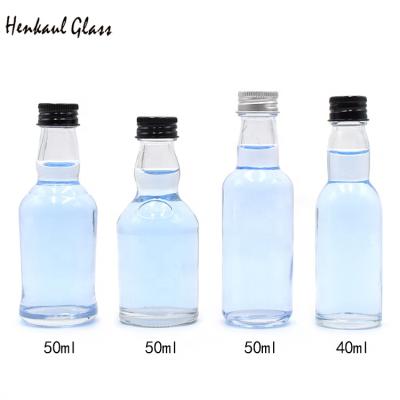 China 50ML Different Sizes High Quality Custom Glass Mini Whiskey Bottle Eco-friendly Recyclable for sale