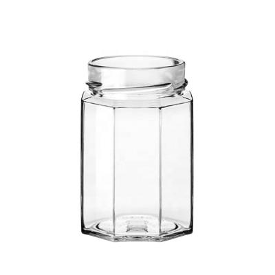 China Eco-friendly 390ML Recyclable Reusable Empty Hexagonal Glass Jars Flint Industrial Use Food Packaging for sale