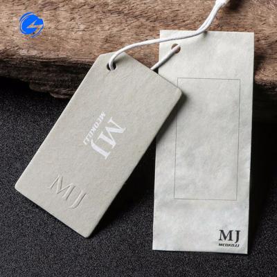 China Wholesale high quality viable brand logo custom factory paper embossed garment accessories brand logo apparel hangtag for sale