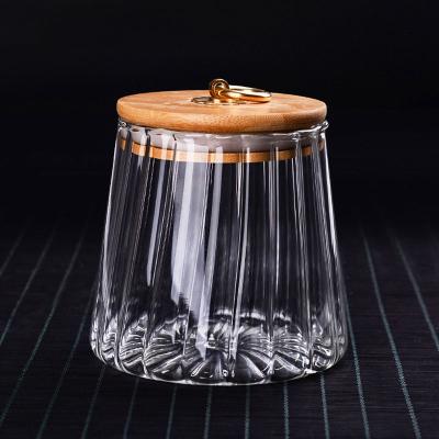 China Viable Factory Direct Multifunctional Pasta Container With Lid Around Honey Glass Food Jar Metal Lid Food Container for sale