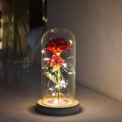 China Wholesale China Red Rose with Led Light in Christmas Decoration Glass Dome Glass Dome with Base for Christmas for sale