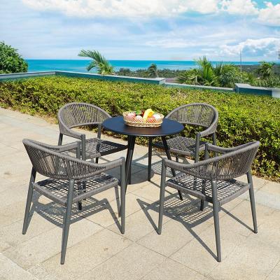 China Scandinavia Outdoor Leisure Rattan Dining Table Courtyard Cafe Rattan Chair Furniture Garden Terrace Balcony And Chair Tea for sale