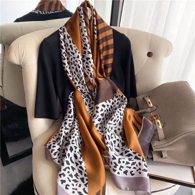 China Brand Silk Scarf Hijabs Head Scarfs Leopard Printing Wholesale Women Soft Smooth Feeling Long Scarf Design Foulard Luxury Custom Made Stoles Beach for sale