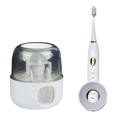 China Viable F1-661 Toothpaste Dispenser Toothpaste Squeezer Wall Mounted Automatic Toothpaste Squeezer for sale