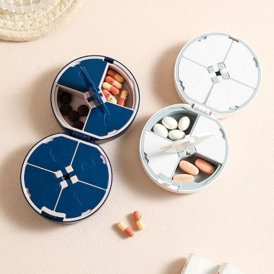 China Eco-Friendly Weekly Pill Organizer Customized Logo Pill Box Round for Travel Portable 7 Compartment Pill Case Organizer for sale